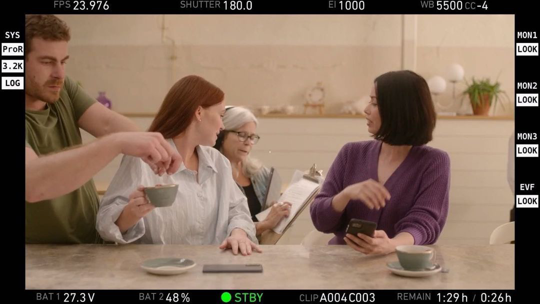 Cora Kim behind the scenes shooting a commercial for CDIC